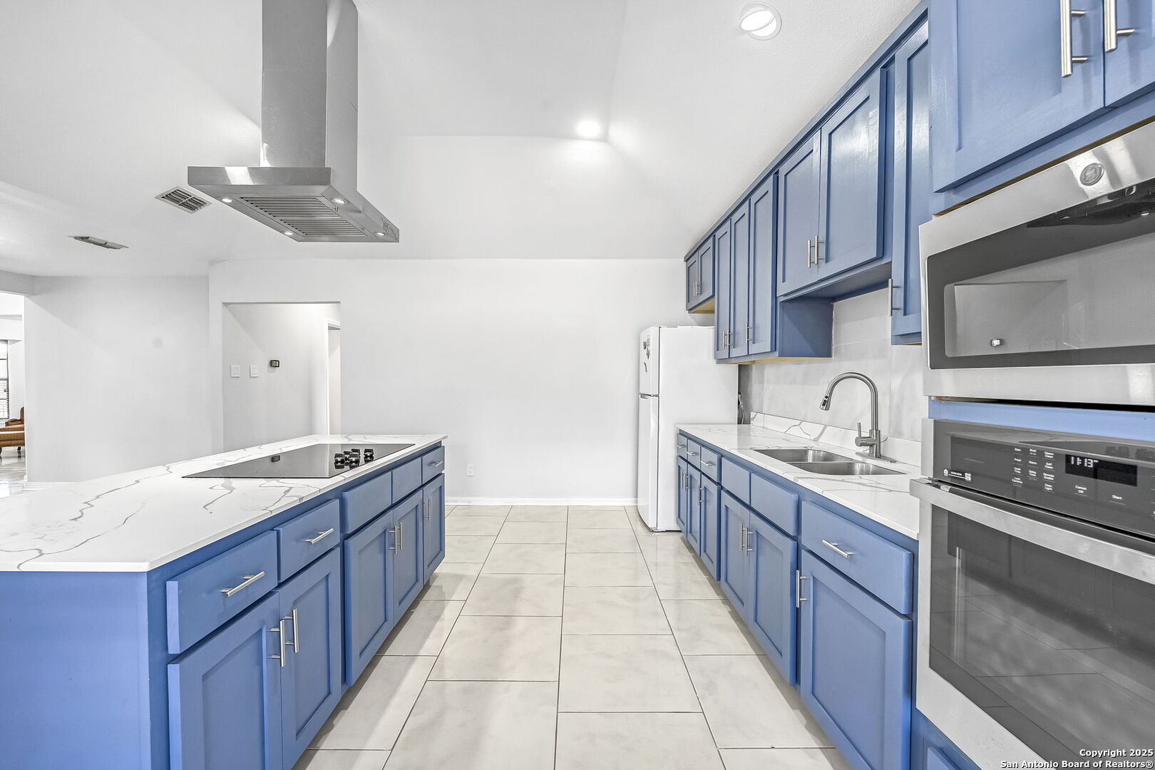 514 Jackson Keller Road San Antonio, TX 78216 - Photo 13 of 25 a kitchen with granite countertop a sink stove and cabinets