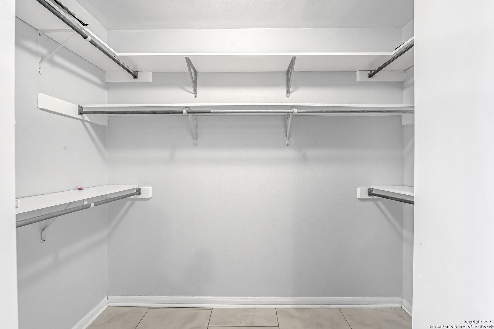 514 Jackson Keller Road San Antonio, TX 78216 - Photo 20 of 25 a view of an empty walk in closet