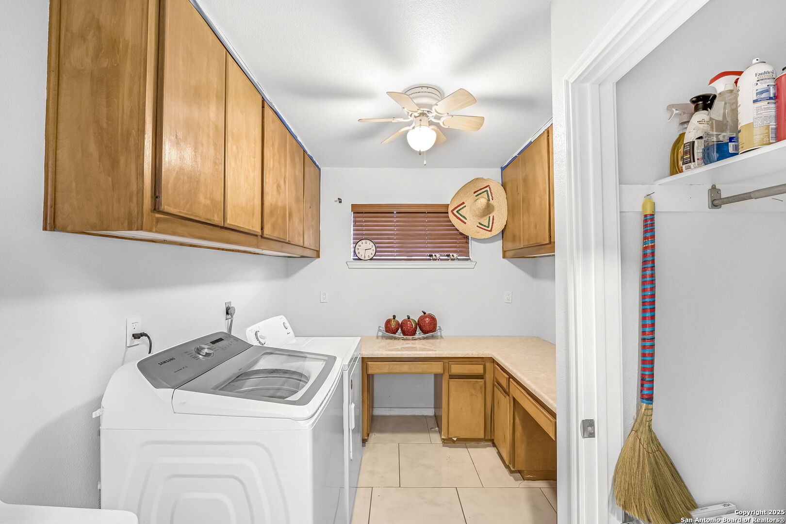 514 Jackson Keller Road San Antonio, TX 78216 - Photo 21 of 25 a utility room with sink dryer and washer