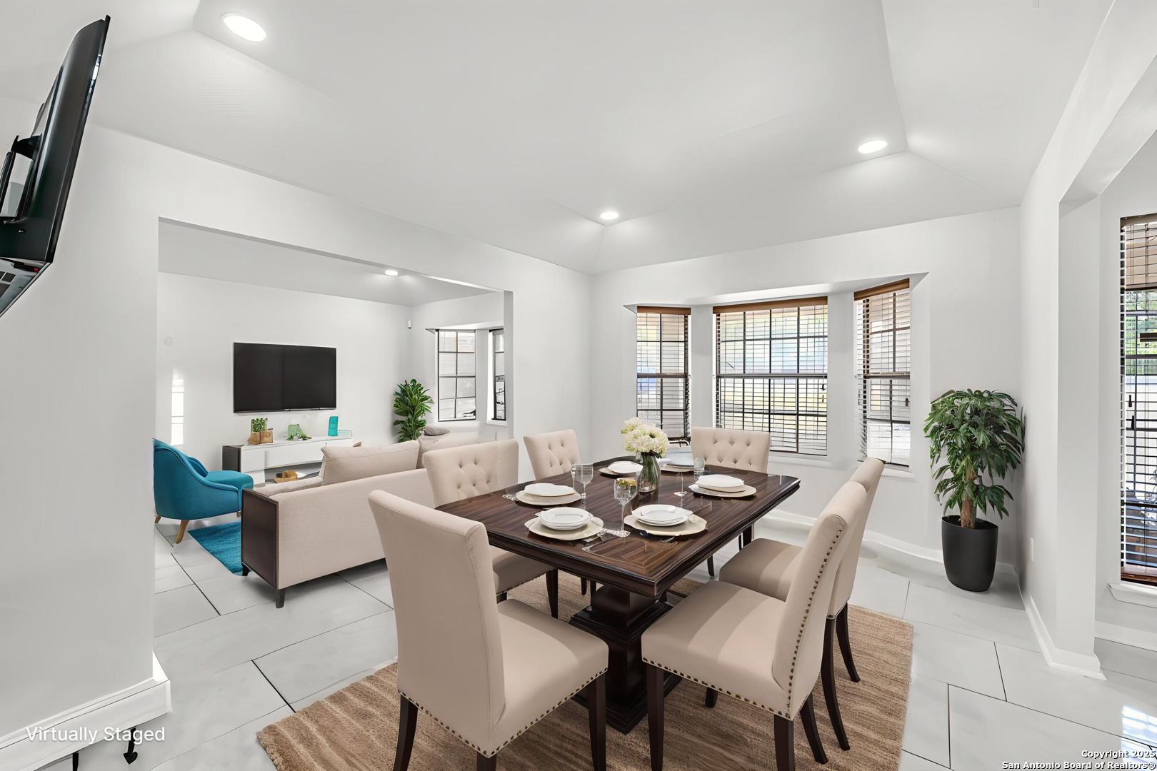 514 Jackson Keller Road San Antonio, TX 78216 - Photo 5 of 25 a view of a dining room with furniture and a flat screen tv