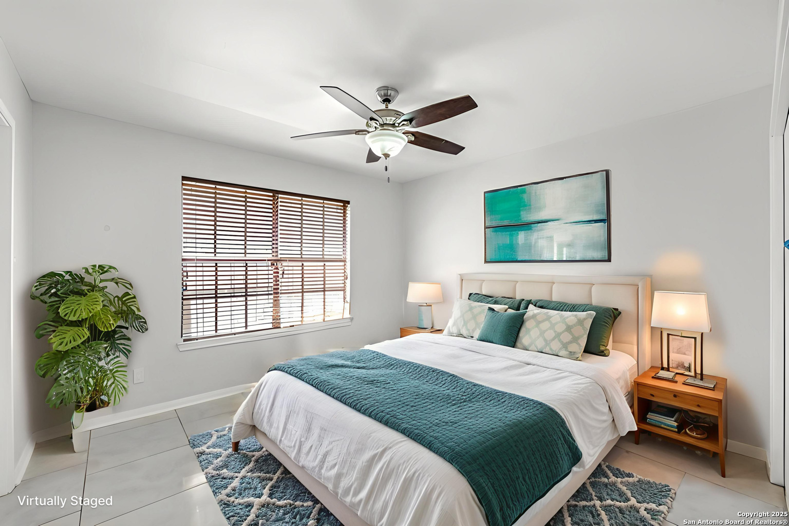 514 Jackson Keller Road San Antonio, TX 78216 - Photo 9 of 25 a bedroom with a bed and a window