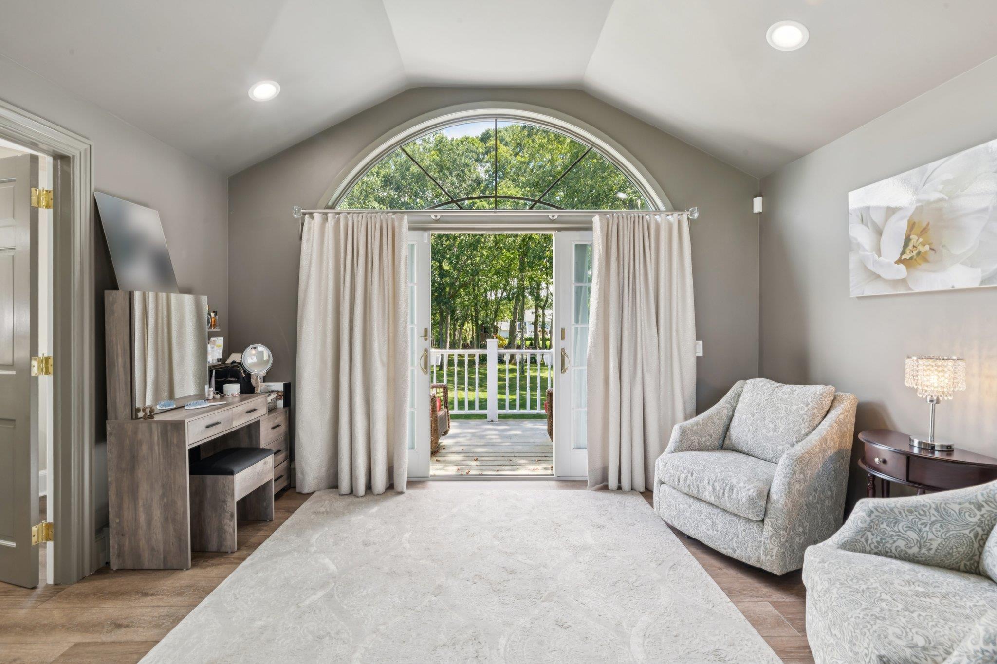 21 Inlet View Path East Moriches, NY 11940 - Photo 22 of 40 Sitting room with vaulted ceiling, wood finished floors, and recessed lighting