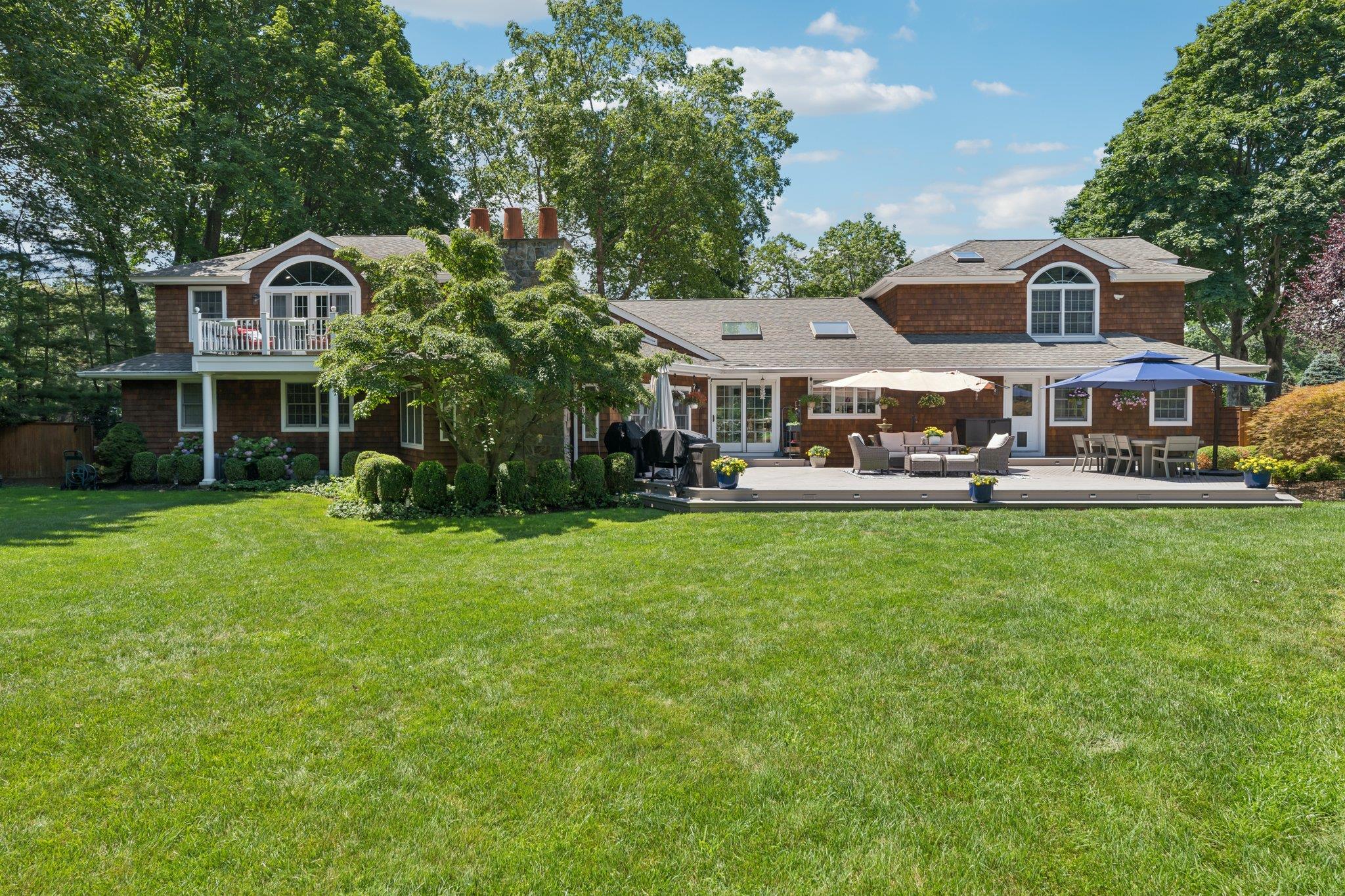 21 Inlet View Path East Moriches, NY 11940 - Photo 36 of 40 Rear view of property with an outdoor living space, a chimney, a yard, and french doors
