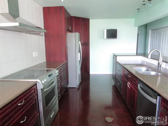 a bathroom with a sink a vanity and a mirror