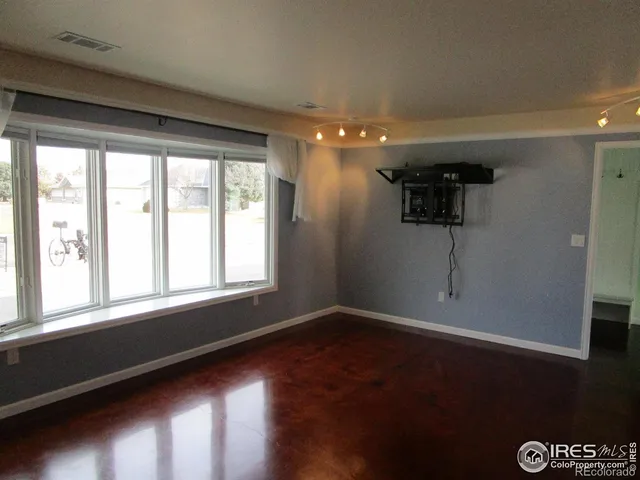 a view of a livingroom with a window