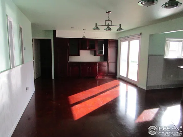 a view of a room with furniture and a fireplace
