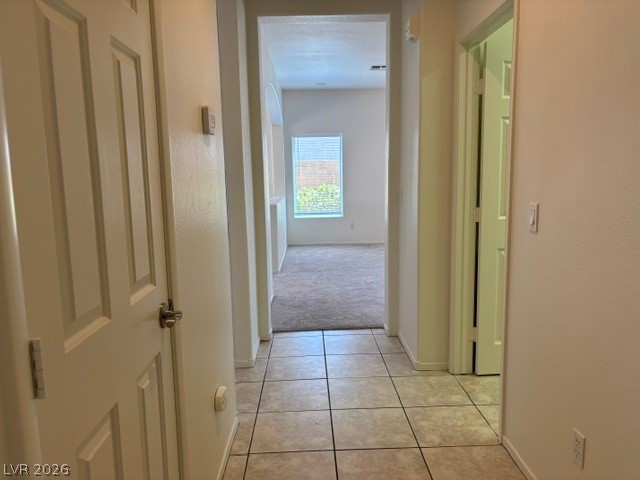 2866 Shimmering Bay Street Laughlin, NV 89029 - Photo 13 of 32 Step into this luminous hallway, where neutral tones invite a personalized touch.