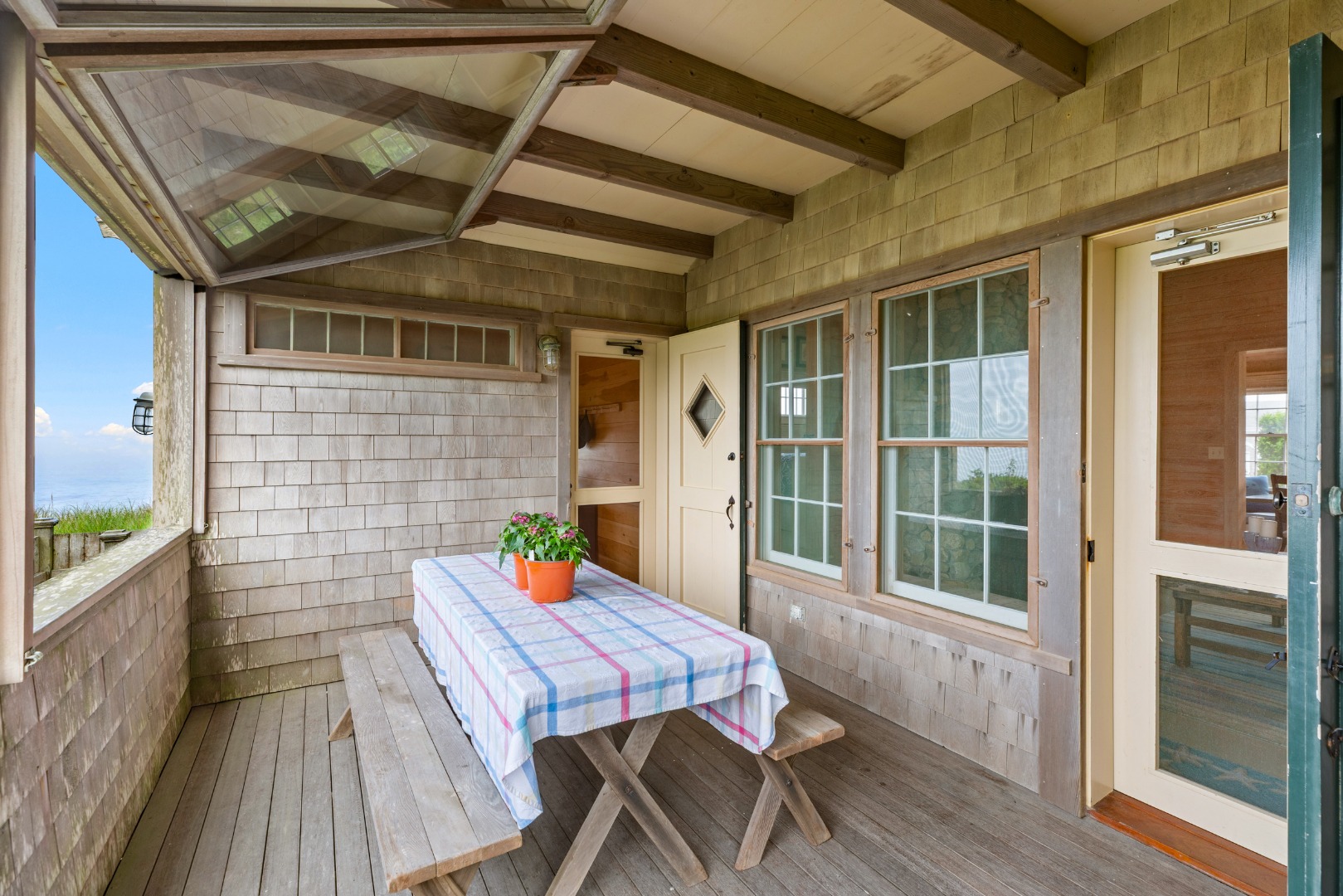 3 North Gully Road Nantucket, MA 02554 - Photo 15 of 43 a balcony with furniture and wooden floor