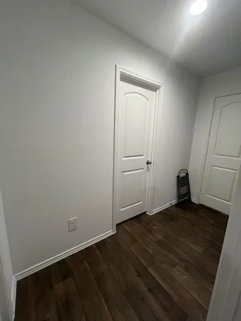 a view of a yard in front of the house