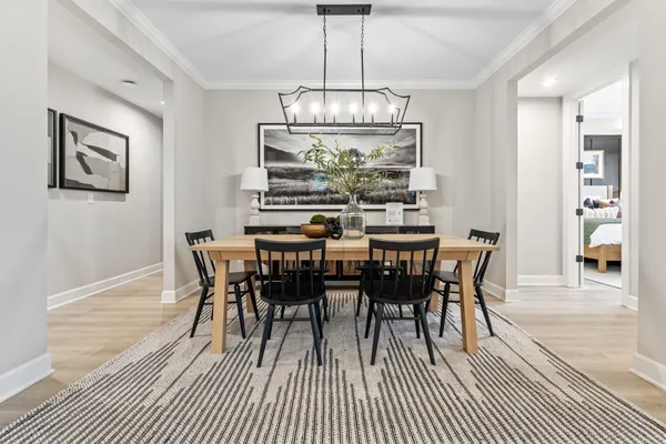 a view of a dining room with furniture