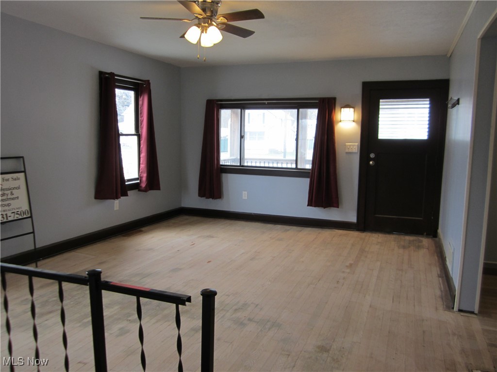 10464 Lagrange Road Elyria, OH 44035 - Photo 5 of 28 Foyer with light hardwood / wood-style floors and ceiling fan