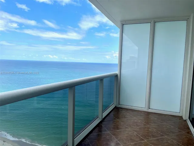 a view of an ocean from a balcony
