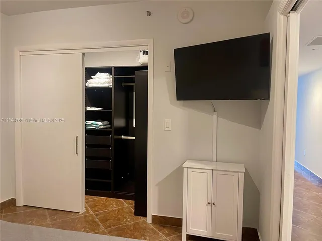a view of a livingroom with wooden floor