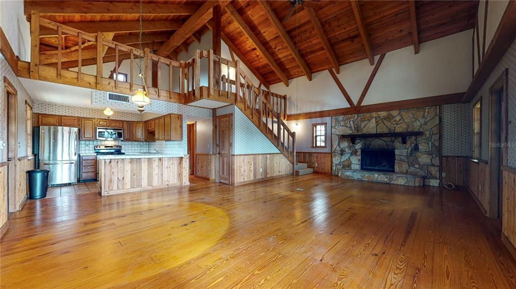 19803 Reading Road Lutz, FL 33558 - Photo 22 of 48 a view of empty room with wooden floor