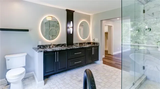 a view of a room with wooden floor and stairs