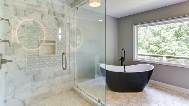 a view of a hallway with wooden floor and entryway