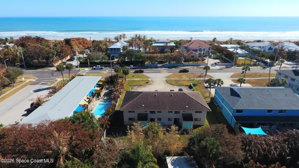 a view of a city with an ocean view