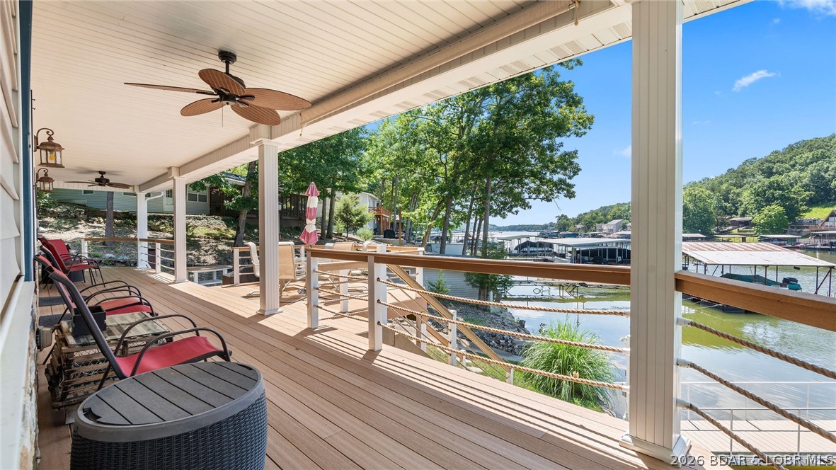 29155 Bellwood Road Rocky Mount, MO 65072 - Photo 3 of 98 Large Covered Deck with a cove location view.