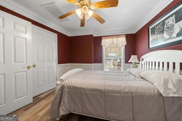 a view of a balcony with yard