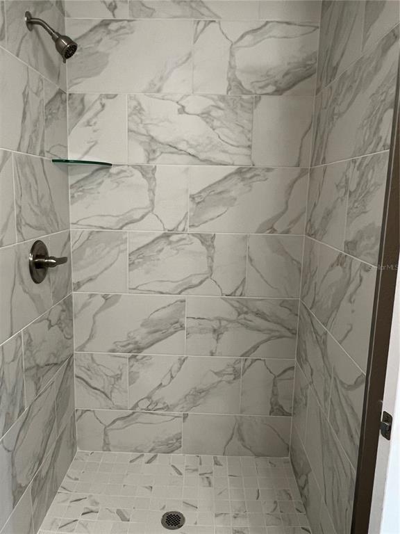 20855 Beach Boulevard Dunnellon, FL 34431 - Photo 10 of 14 a bathroom with a shower