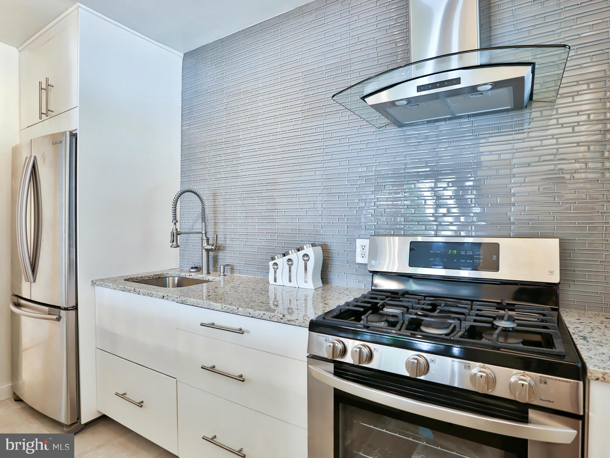 4646 Marble Hall Road Baltimore, MD 21239 - Photo 13 of 30 Granite Counters And Stainless Steel Appliances