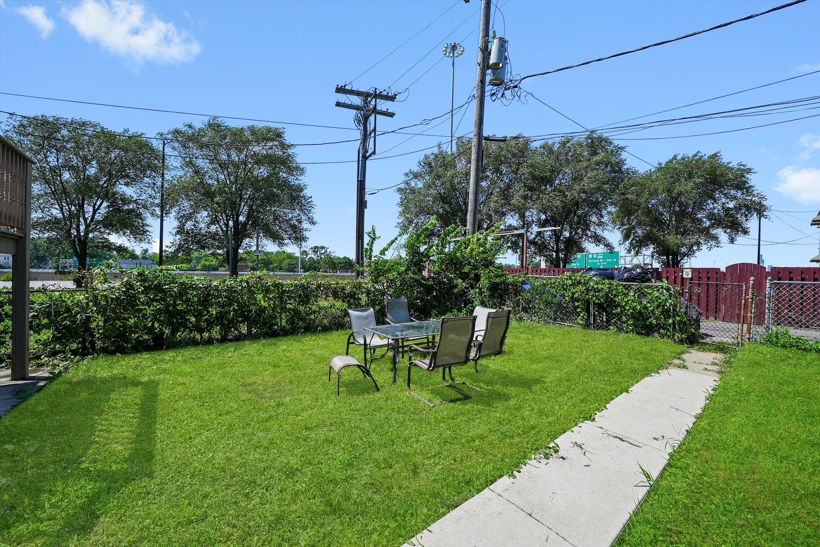 142 West Swann Street Chicago, IL 60609 - Photo 30 of 42 a view of a chair in the garden
