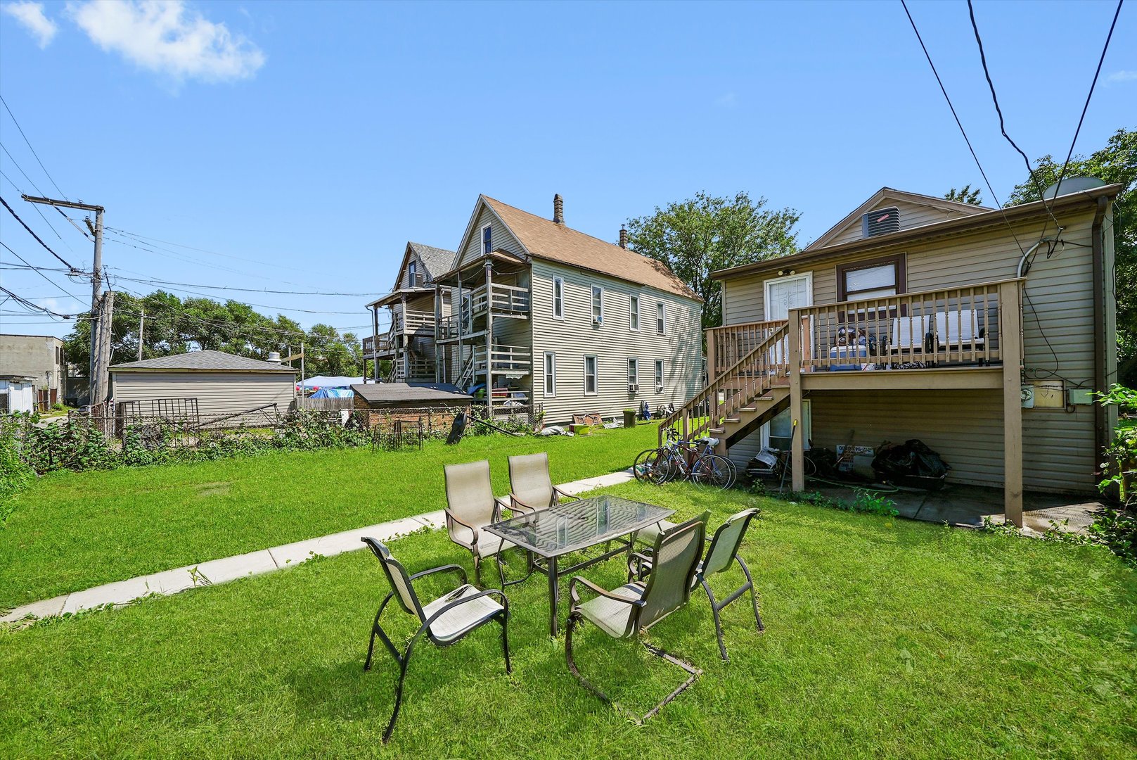 142 West Swann Street Chicago, IL 60609 - Photo 31 of 42 a view of a house with a yard porch and sitting area