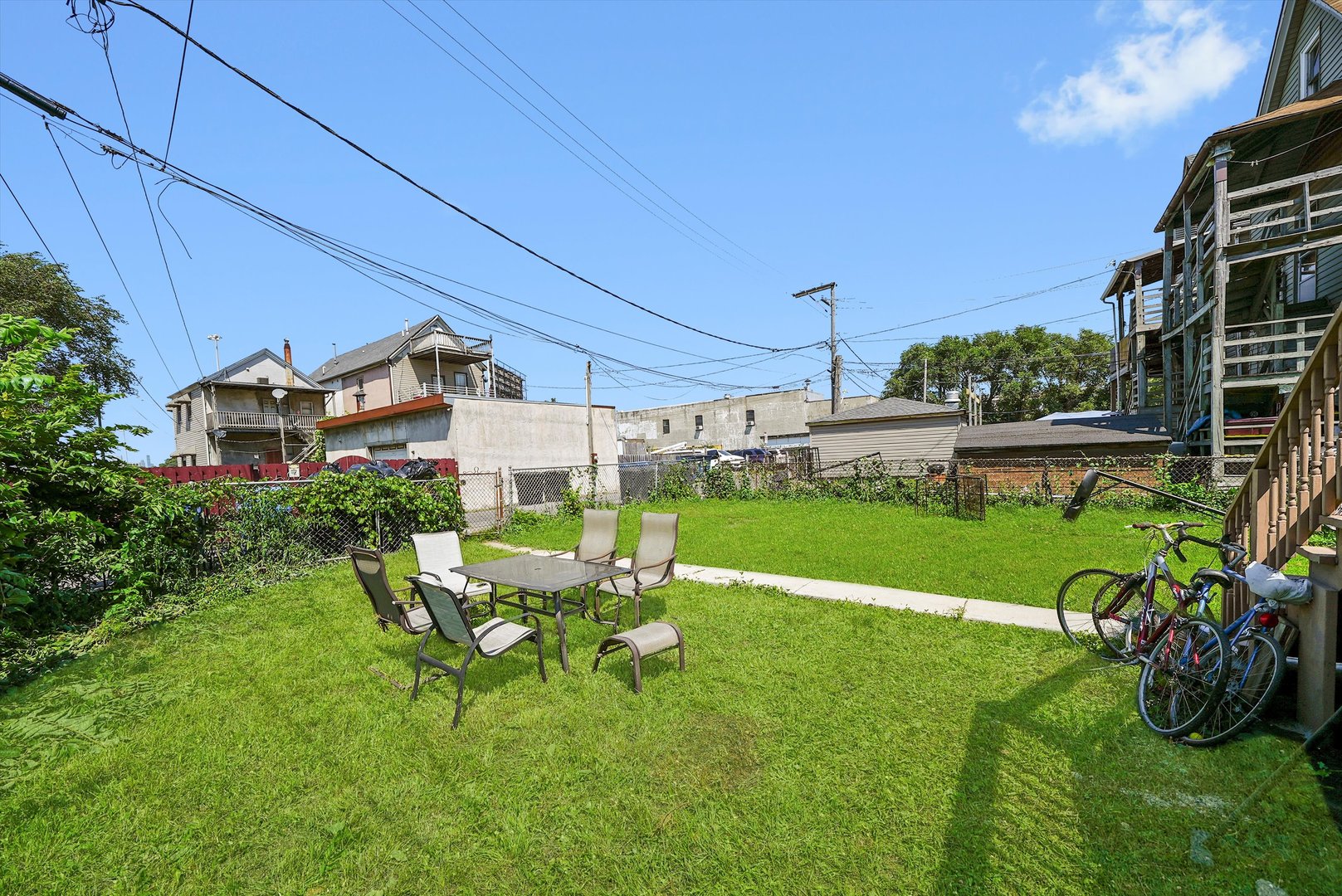 142 West Swann Street Chicago, IL 60609 - Photo 32 of 42 a view of a chair and table in the garden