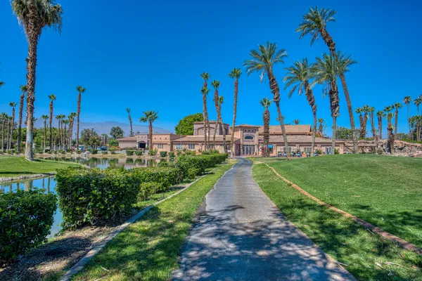 a view of a park with palm trees