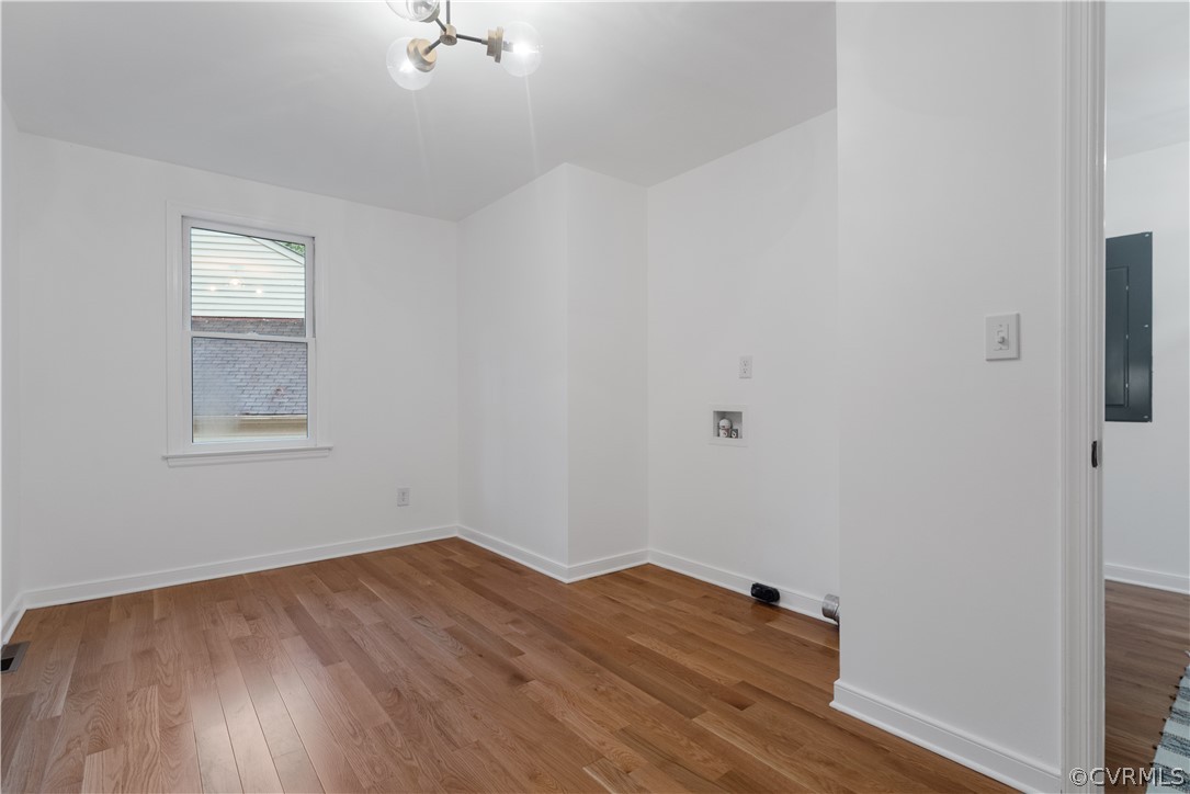 13807 Barnes Spring Road Midlothian, VA 23112 - Photo 23 of 49 a view of a room with wooden floor and fan