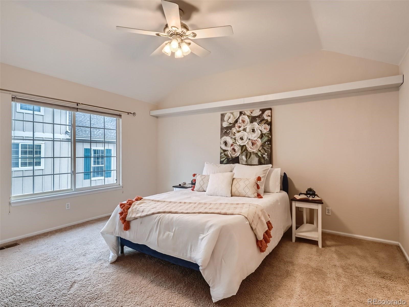 6224 Secrest Street Arvada, CO 80403 - Photo 6 of 16 a bedroom with a bed and a window