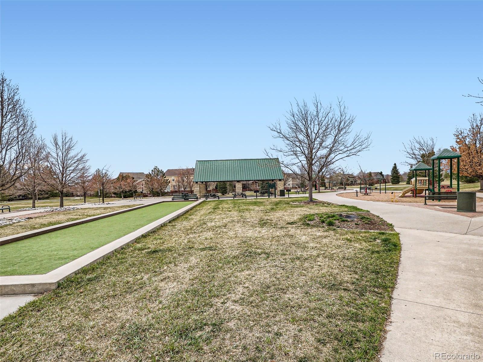 6224 Secrest Street Arvada, CO 80403 - Photo 10 of 16 a view of outdoor space yard and swimming pool
