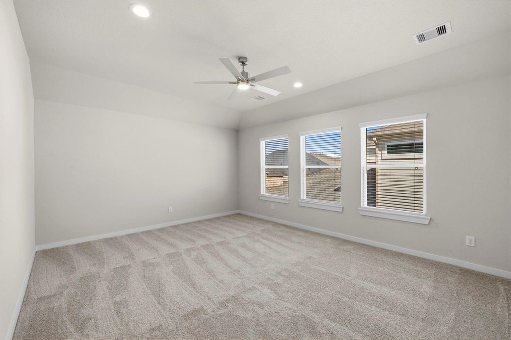 1972 Golden Spruce Lane Conroe, TX 77301 - Photo 17 of 19 a view of an empty room with a window