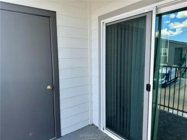 a view of a porch with a yard