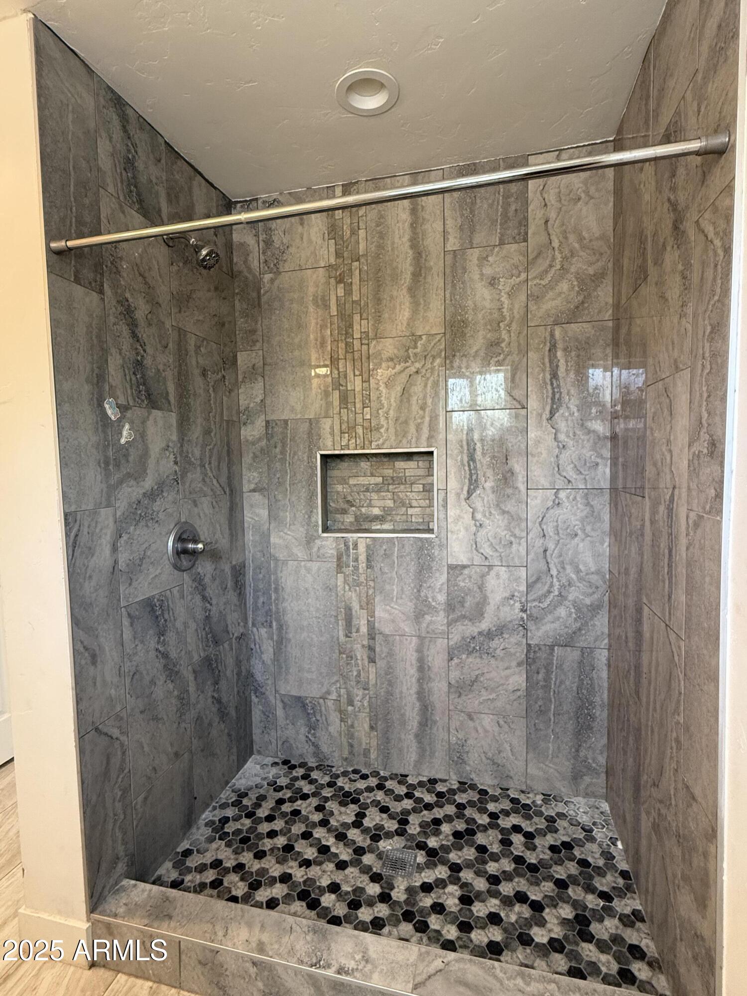 286 Guaymas Court Rio Rico, AZ 85648 - Photo 12 of 16 a bathroom with a shower