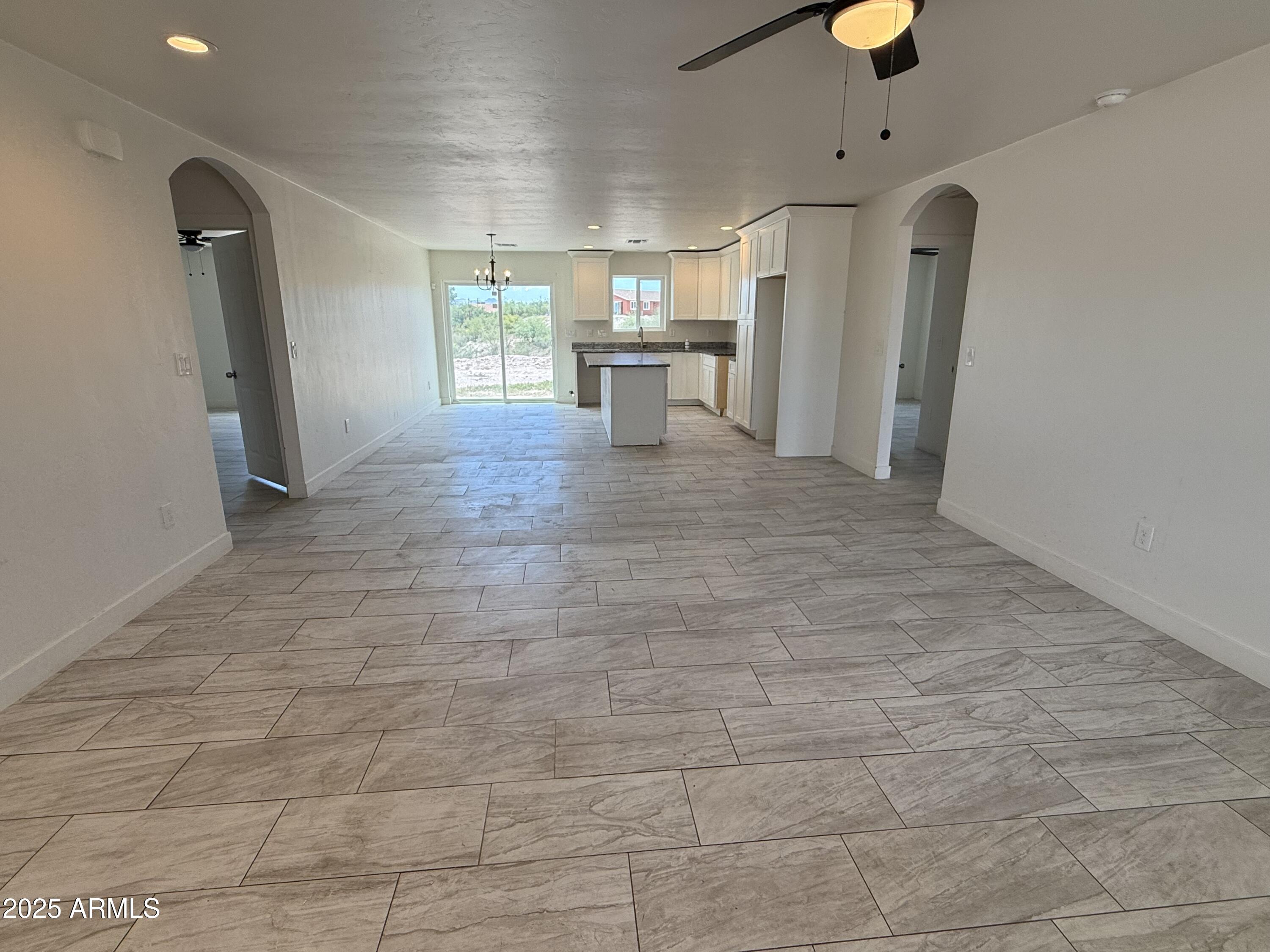 286 Guaymas Court Rio Rico, AZ 85648 - Photo 3 of 16 a view of a refrigerator in kitchen and entryway