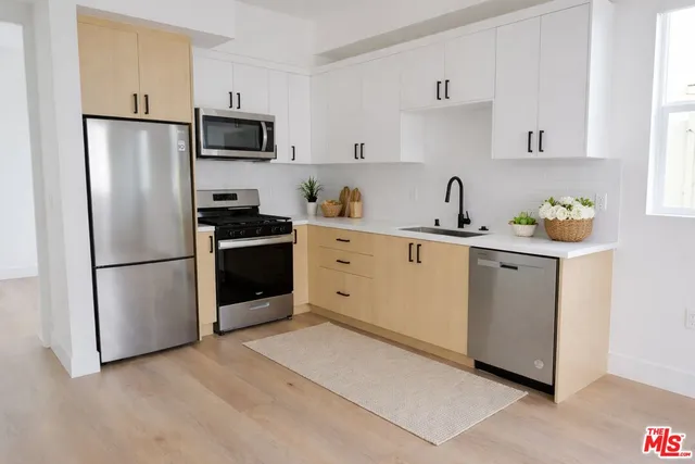 a view of a building with a street