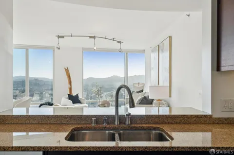 a kitchen with a sink and a window