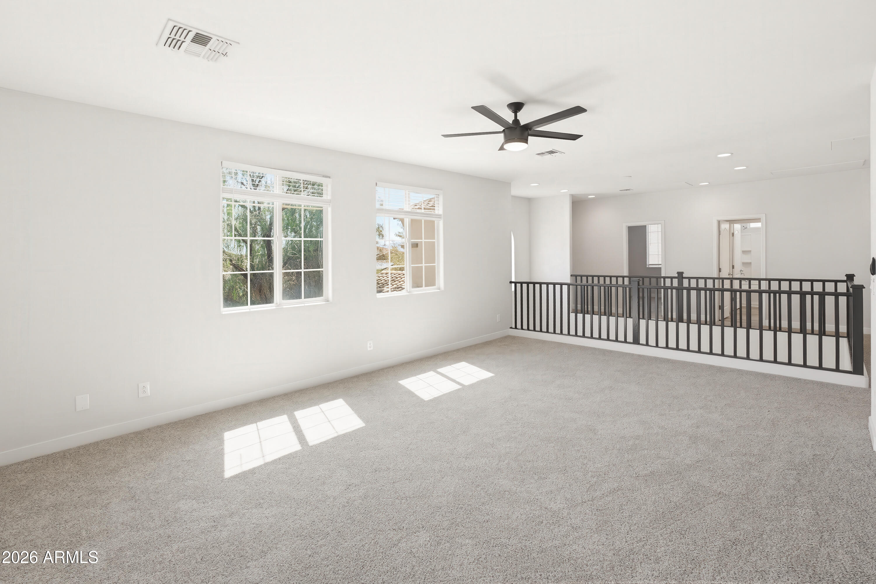 17328 West Bajada Road Surprise, AZ 85387 - Photo 16 of 40 a view of an empty room with a window