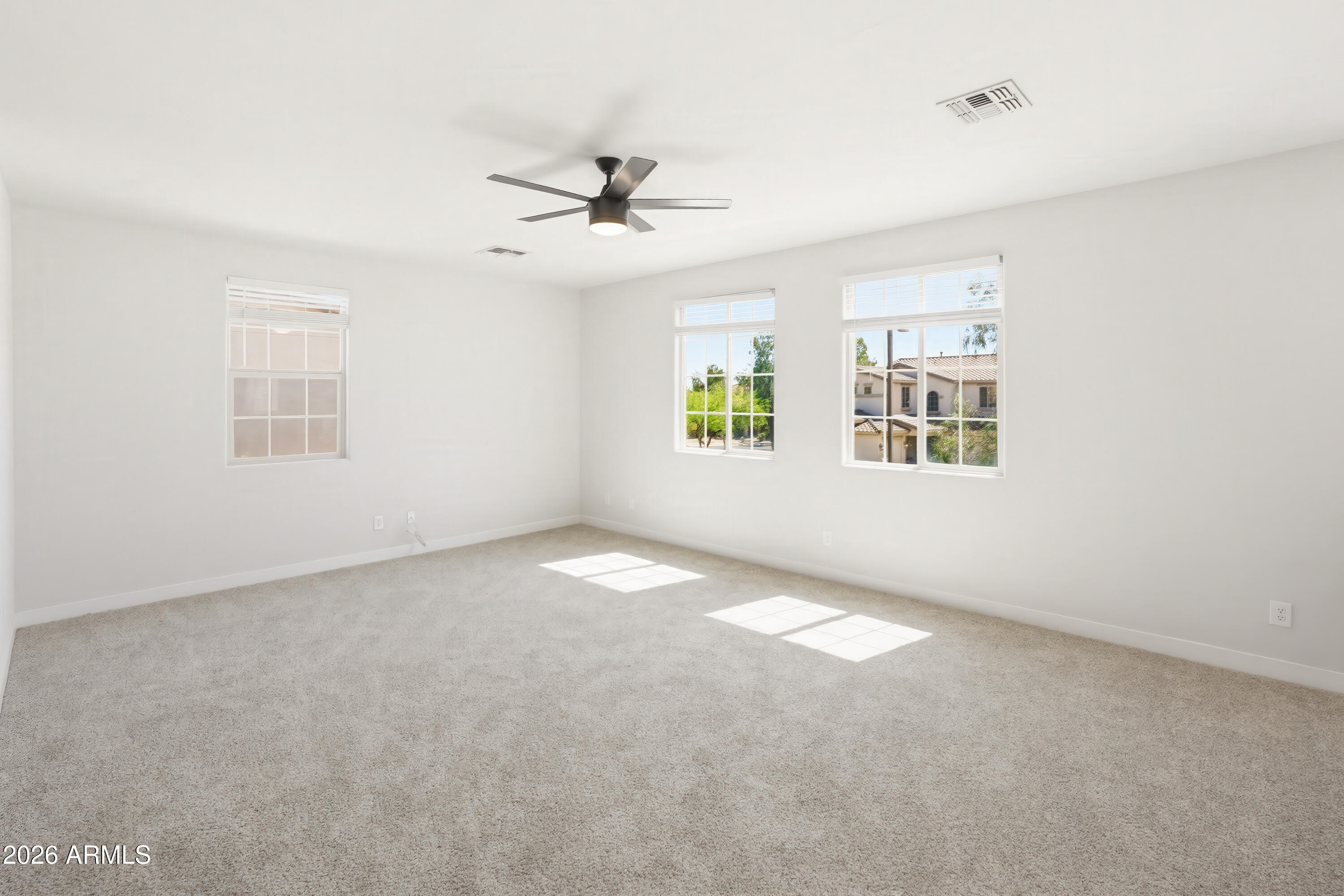 17328 West Bajada Road Surprise, AZ 85387 - Photo 17 of 40 a view of an empty room with a window