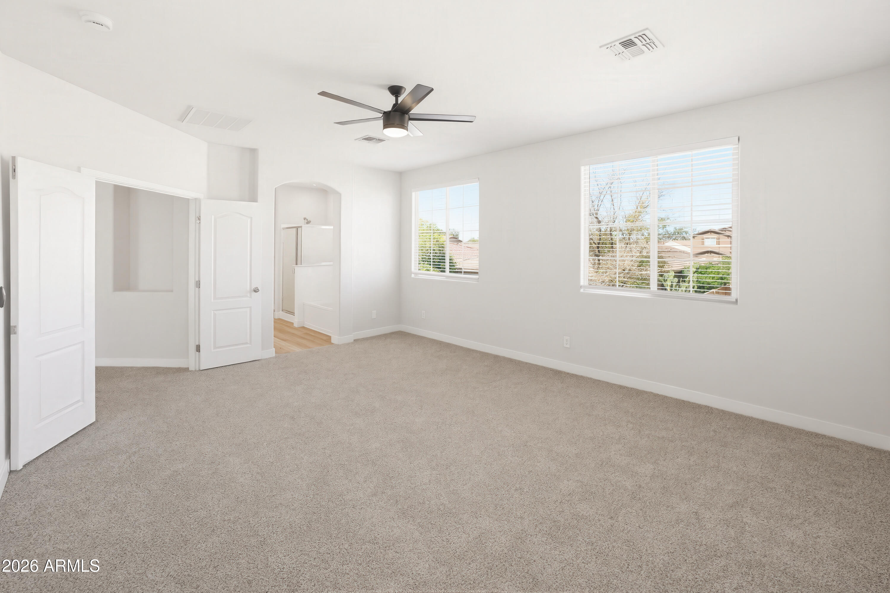 17328 West Bajada Road Surprise, AZ 85387 - Photo 20 of 40 a view of an empty room with a window
