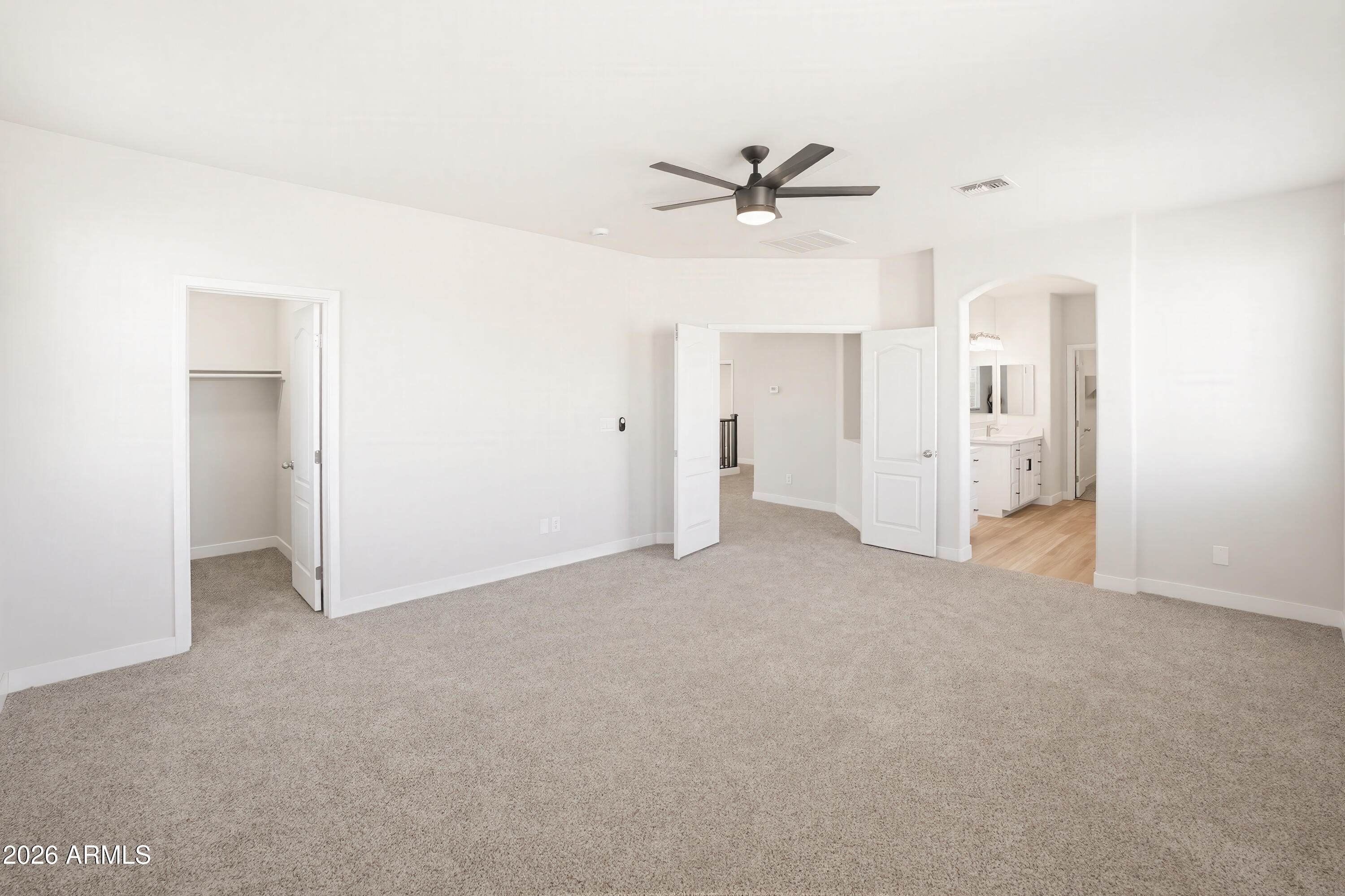 17328 West Bajada Road Surprise, AZ 85387 - Photo 21 of 40 a view of a big room with closet and windows