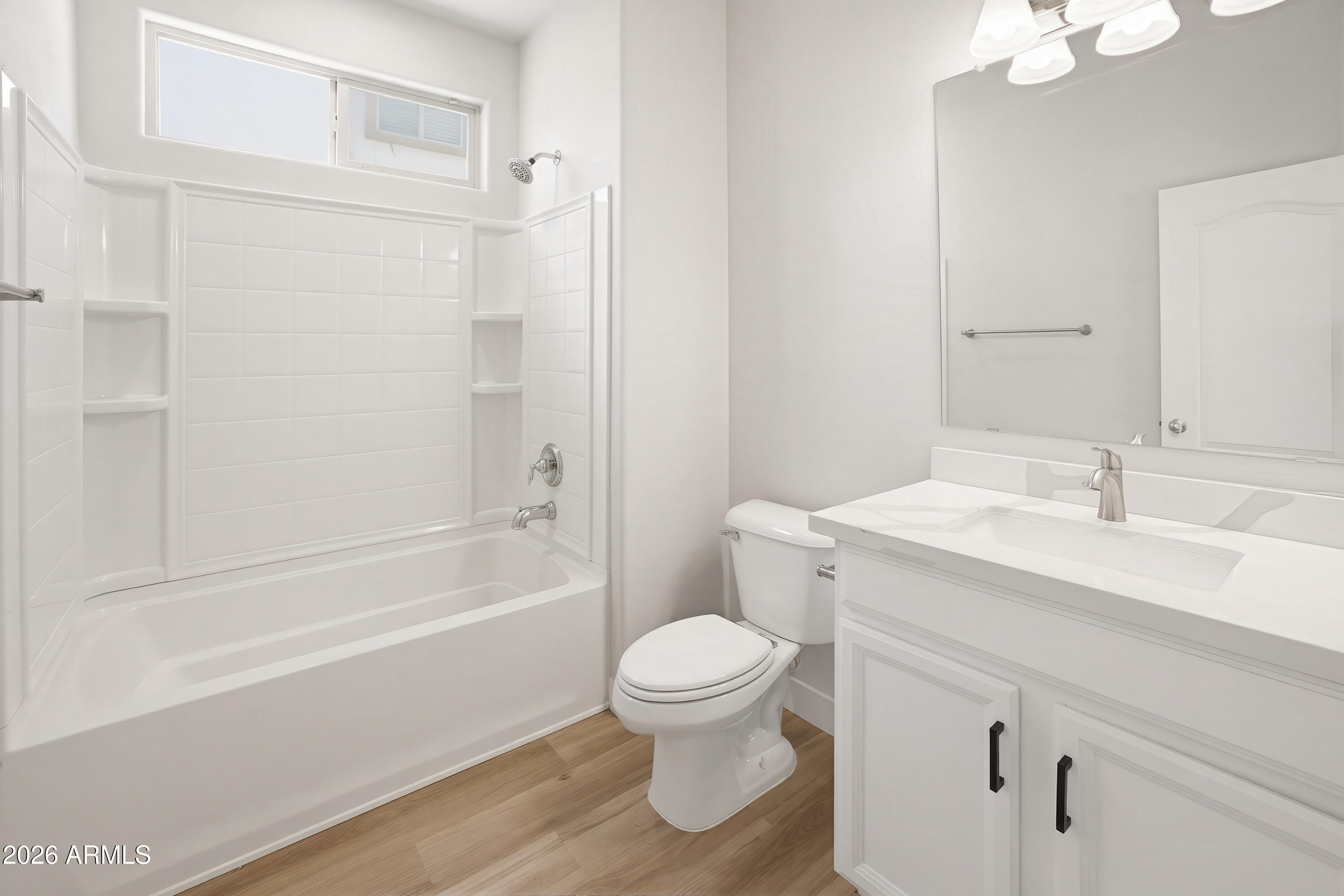 17328 West Bajada Road Surprise, AZ 85387 - Photo 34 of 40 a bathroom with a sink a toilet and shower