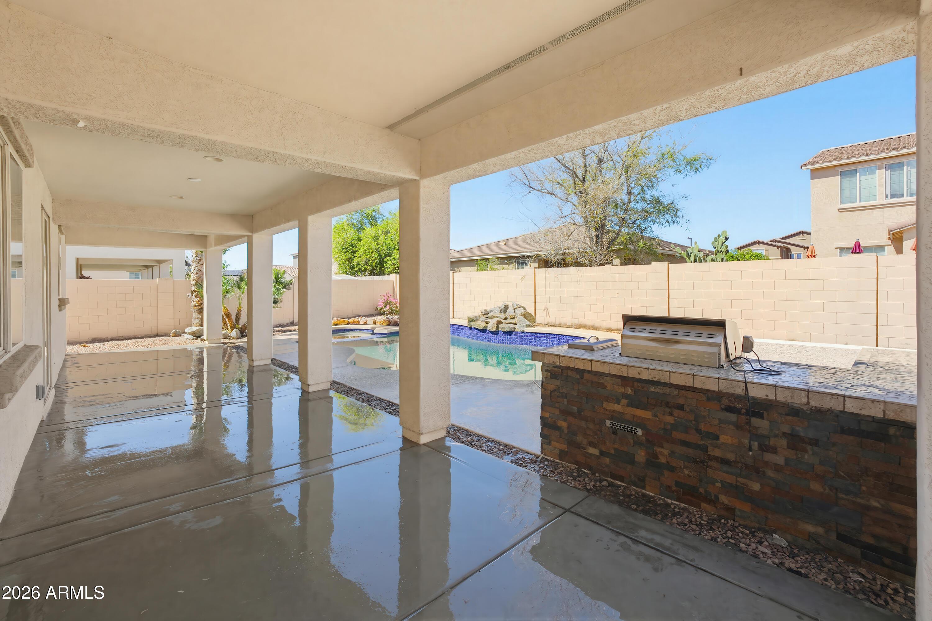 17328 West Bajada Road Surprise, AZ 85387 - Photo 35 of 40 a view of a living room and kitchen with a large window