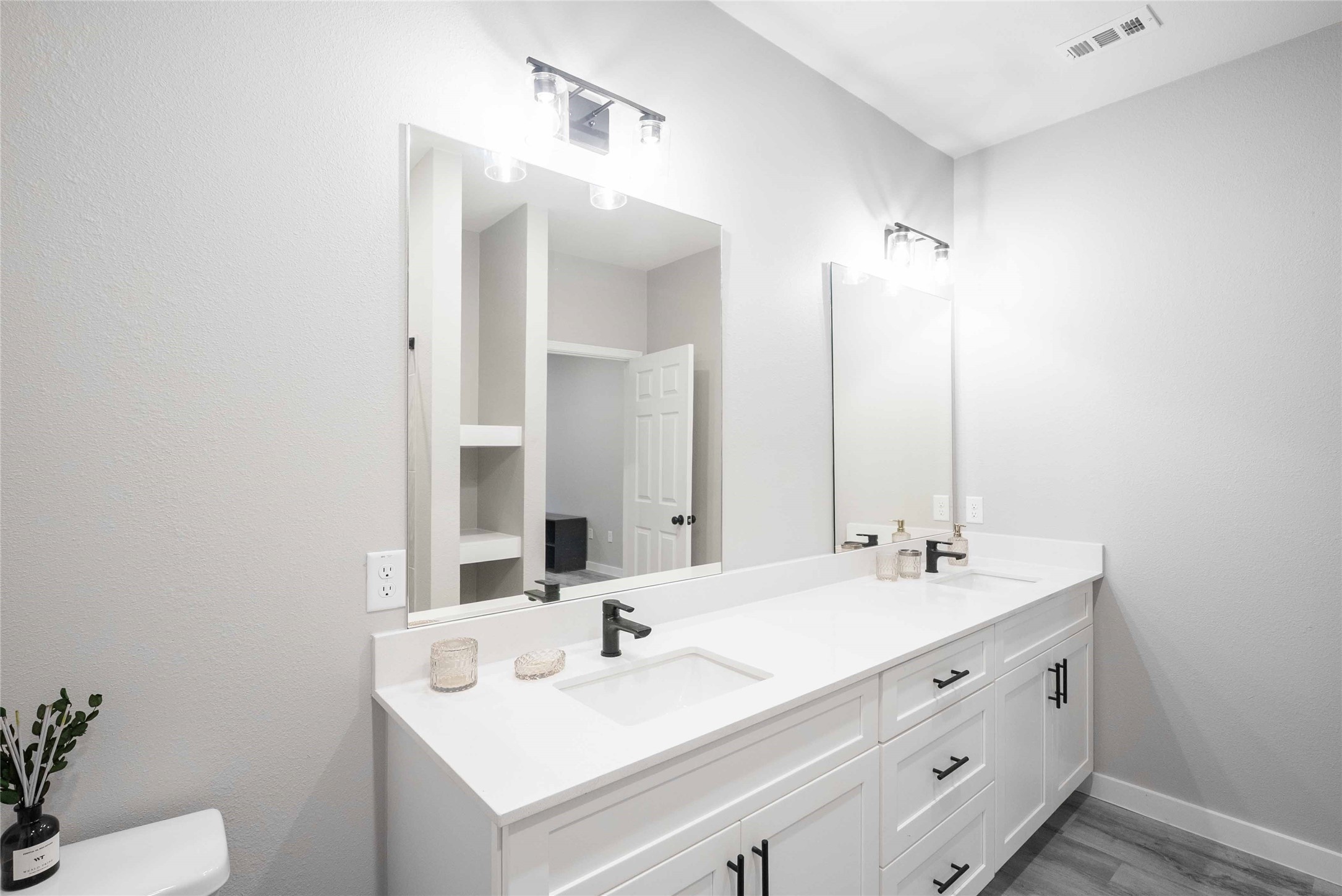 2101 Reinke Road, Unit 3308 Waller, TX 77484 - Photo 9 of 24 a bathroom with a sink double vanity and a mirror