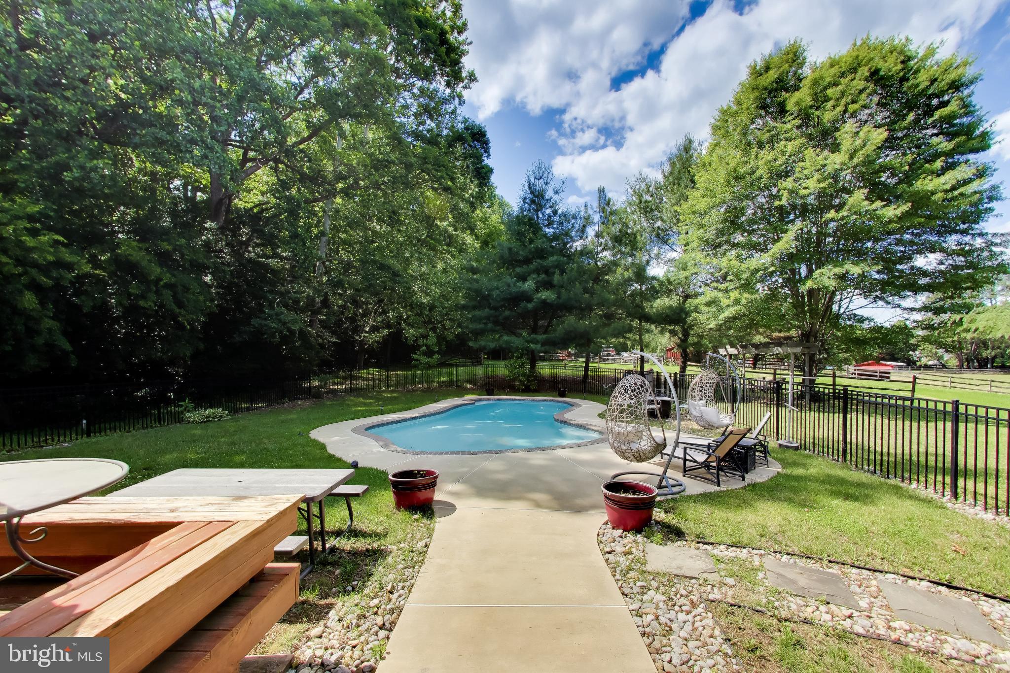3240 Juniper Lane Huntingtown, MD 20639 - Photo 22 of 48 a view of a backyard with sitting area