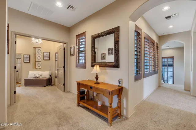 a living room with furniture and a table