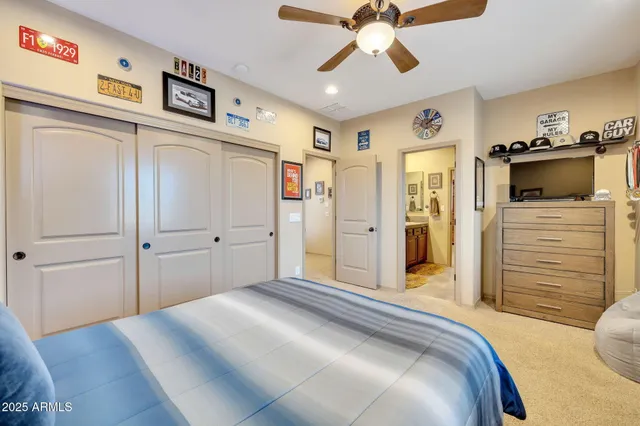 a bedroom with a bed and a walk in closet