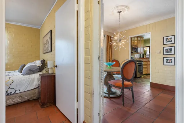 a view of a livingroom with furniture and windows