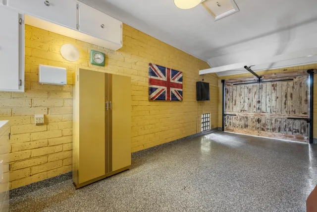 a view of a garage with furniture